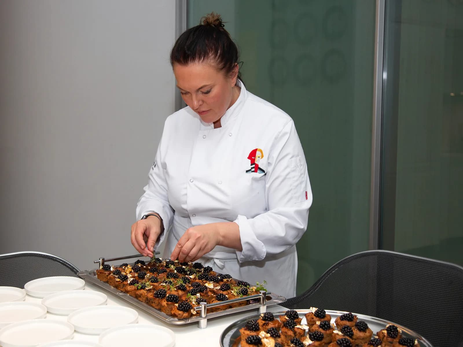 ZIMA chef plating canapés before an event