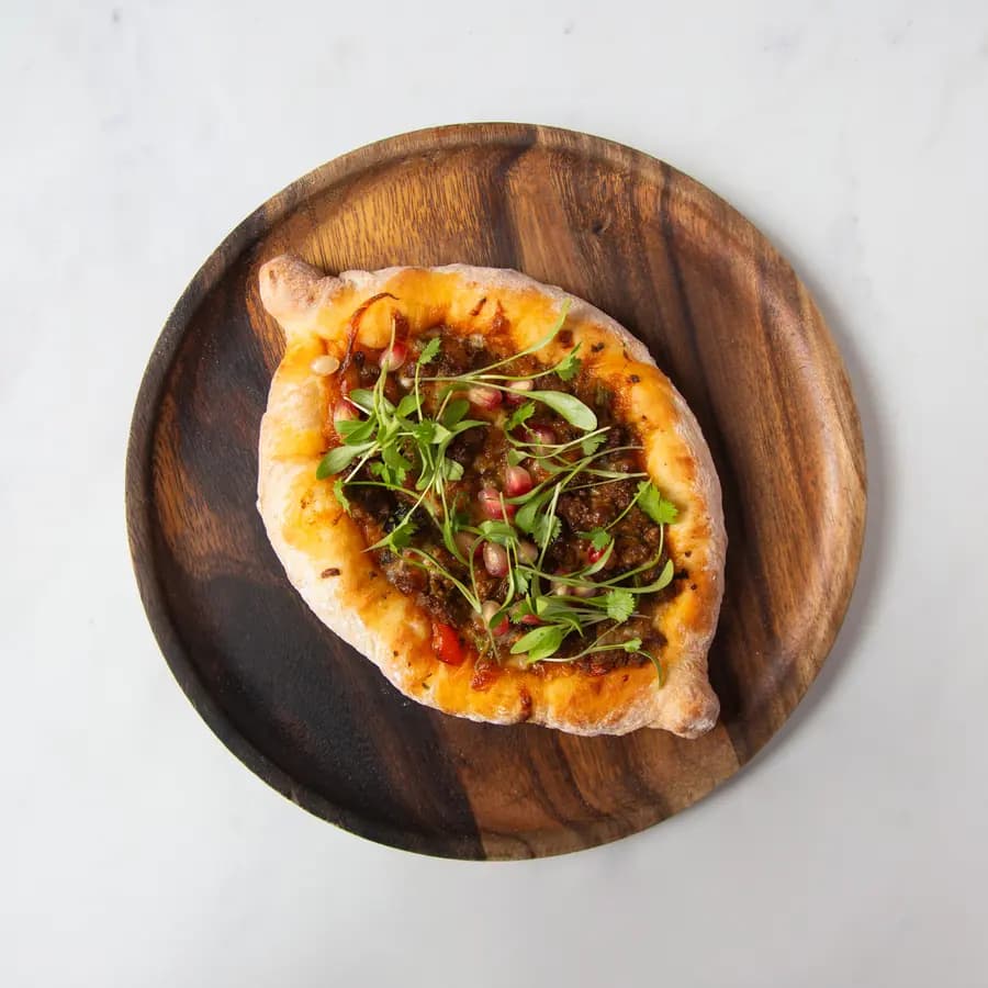 Khachapuri Slice with Lamb and Pomegranate